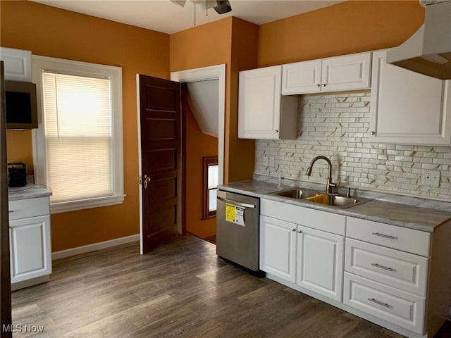 kitchen with ceiling fan, dark wood finished floors, dishwasher, white cabinets, and a sink