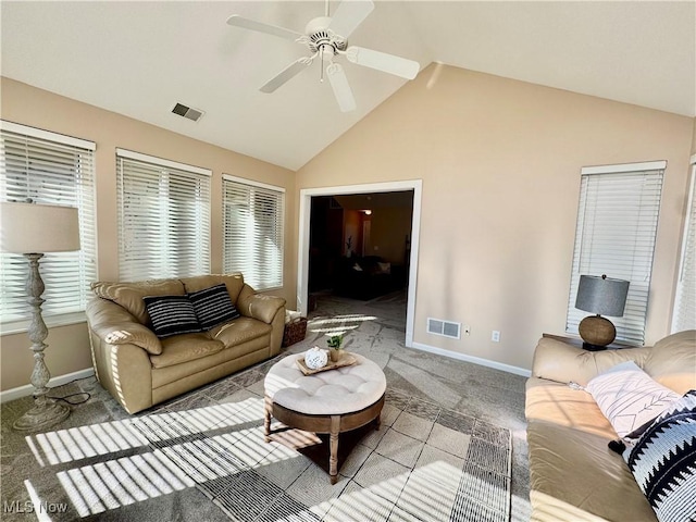 living room with vaulted ceiling, a ceiling fan, visible vents, and light carpet