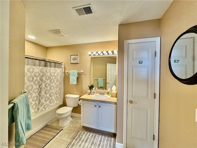 full bath featuring visible vents, toilet, vanity, and tile patterned flooring