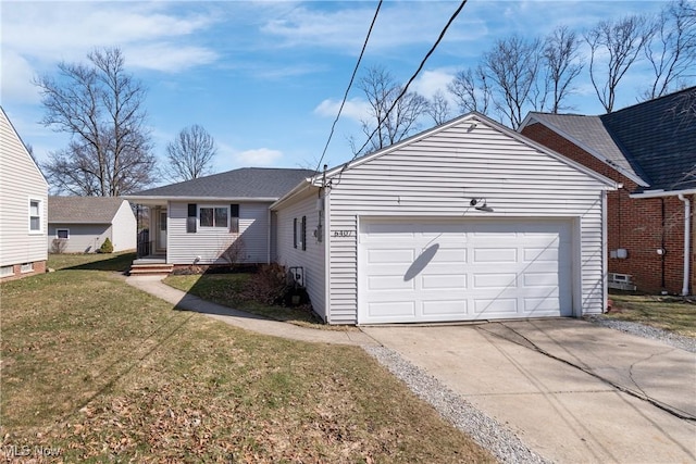 single story home featuring a garage, driveway, and a front yard