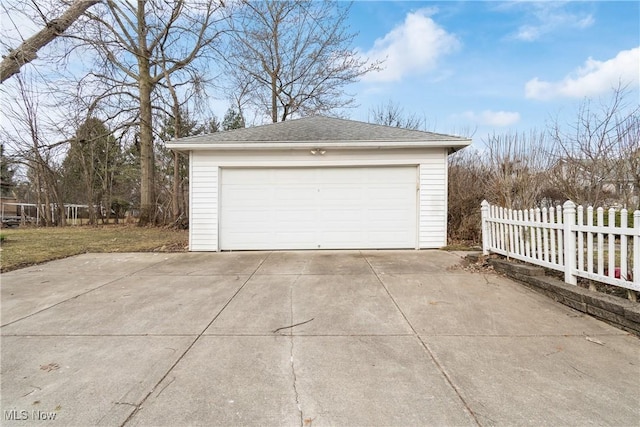 detached garage with fence