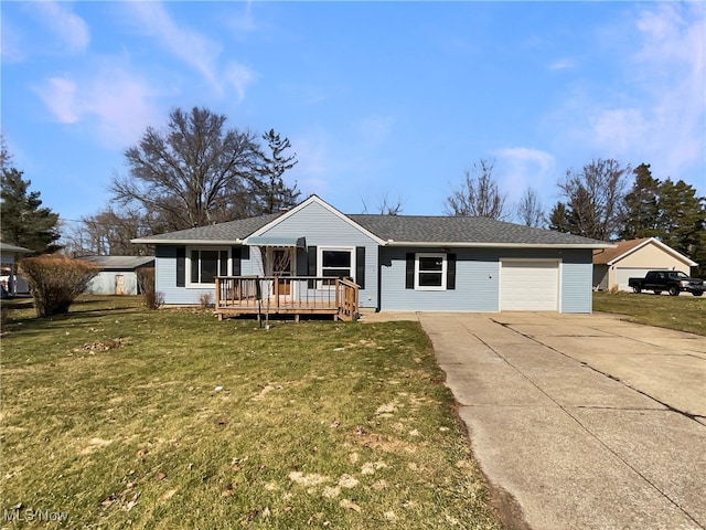 ranch-style house featuring a front yard, roof with shingles, a wooden deck, an attached garage, and concrete driveway