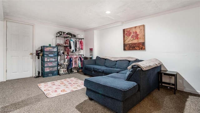 carpeted living area featuring baseboards