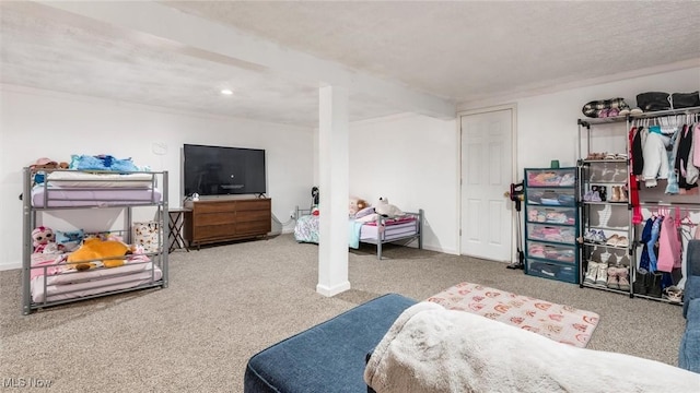 bedroom with baseboards and carpet floors