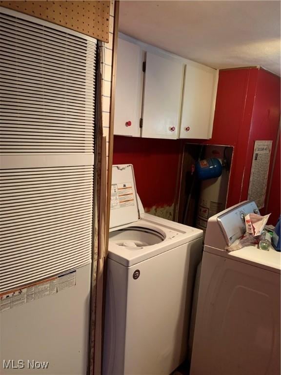 laundry area with cabinet space and washer and dryer