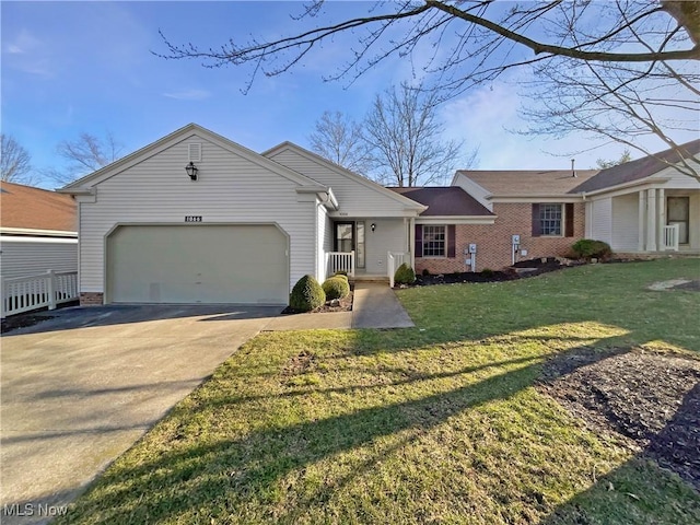 ranch-style home with brick siding, a garage, concrete driveway, and a front lawn