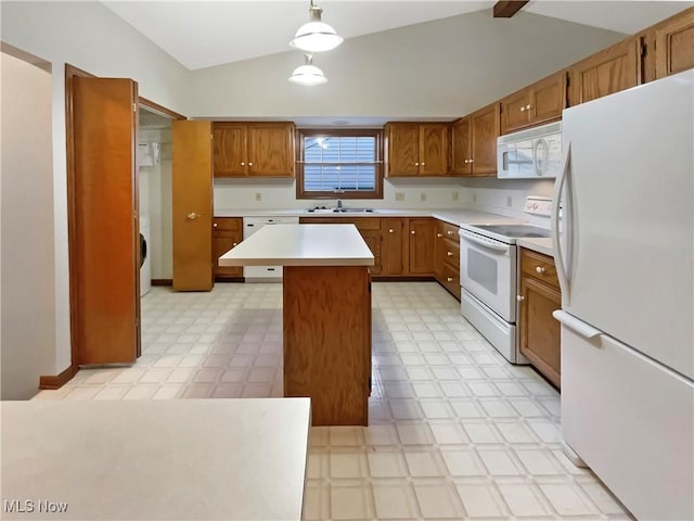 kitchen with a sink, white appliances, light countertops, lofted ceiling, and light floors