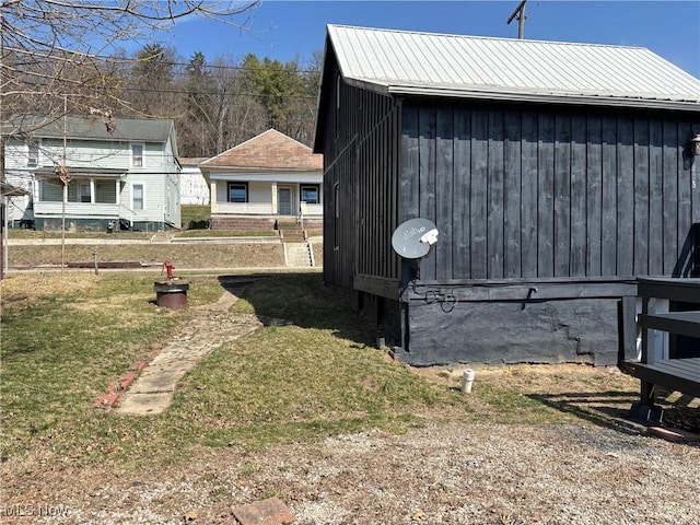 view of property exterior featuring a yard