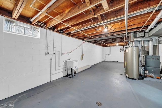 basement with water heater, heating unit, and a sink