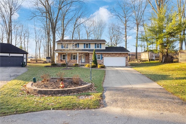 view of front of property with brick siding, an attached garage, concrete driveway, and a front lawn