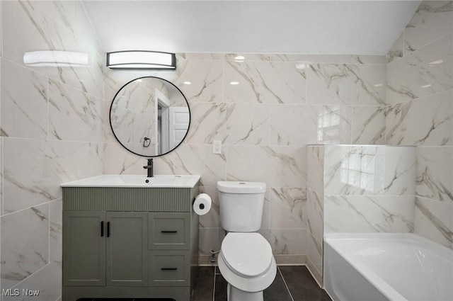 full bath featuring tile patterned floors, a bathing tub, toilet, and vanity