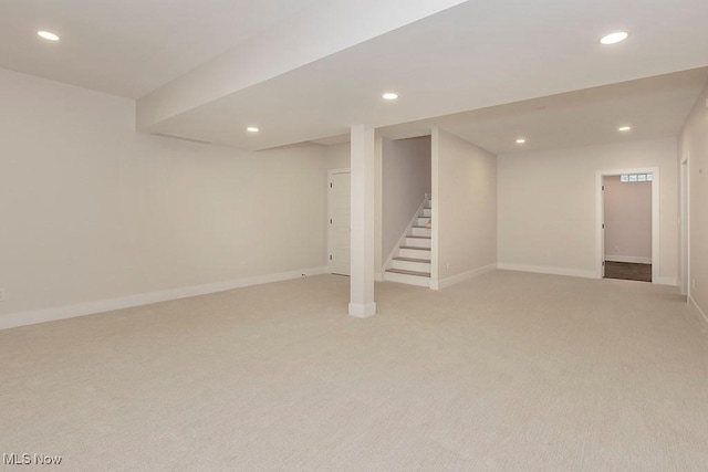 2678 Rocky Ridge Dr, Westlake, OH 44145 - finished below grade area with stairs, recessed lighting, baseboards, and light carpet