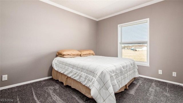 bedroom with baseboards, carpet floors, and crown molding