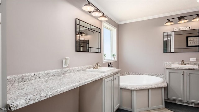 full bathroom with a sink, visible vents, two vanities, and ornamental molding