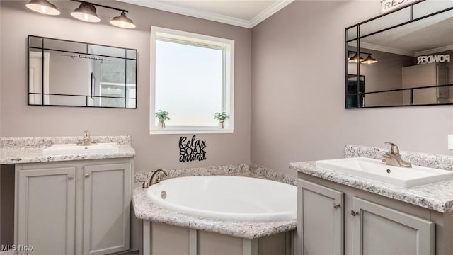 bathroom featuring two vanities, ornamental molding, and a sink