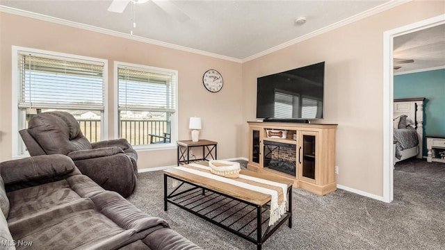 living room with carpet flooring, baseboards, ceiling fan, and ornamental molding