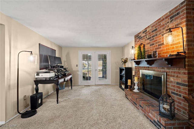 carpeted living room featuring french doors, a fireplace, and baseboards