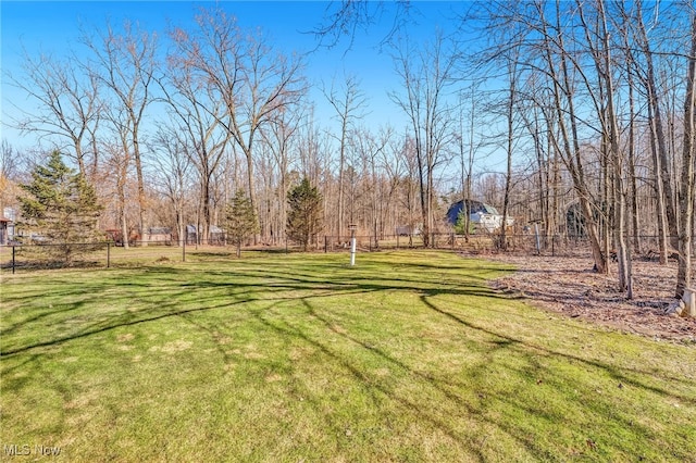 view of yard with fence