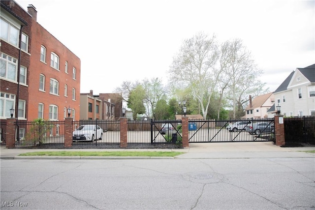 view of road with sidewalks and a residential view