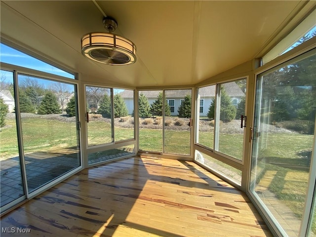 unfurnished sunroom featuring a healthy amount of sunlight