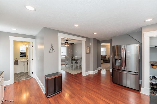 kitchen with recessed lighting, wood finished floors, stainless steel refrigerator with ice dispenser, and ceiling fan