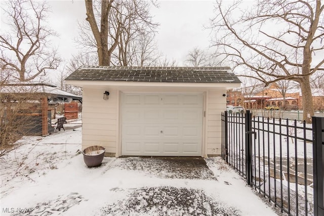 detached garage with fence