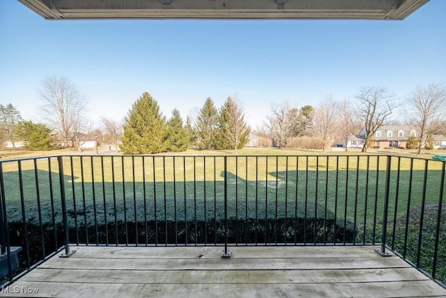 deck featuring a lawn