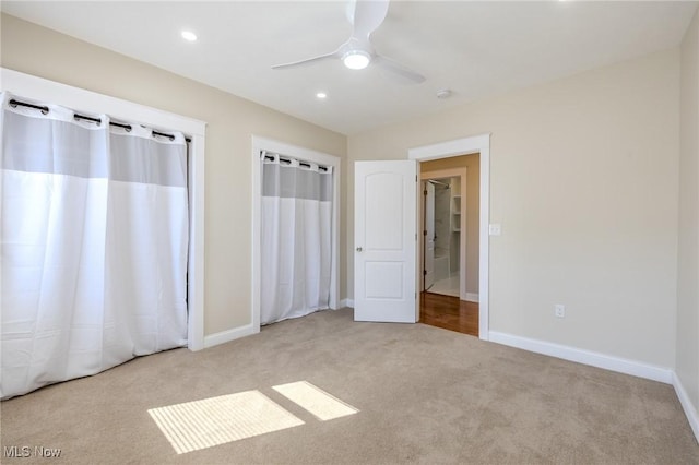 unfurnished bedroom featuring carpet flooring, recessed lighting, a ceiling fan, and baseboards