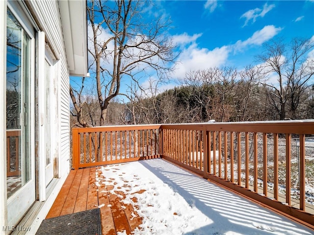 view of snow covered deck