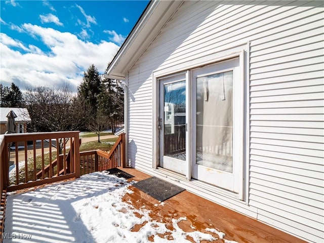 view of snow covered deck