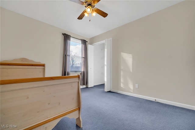 bedroom featuring baseboards, carpet, and a ceiling fan