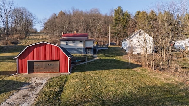 view of outbuilding featuring an outdoor structure and dirt driveway