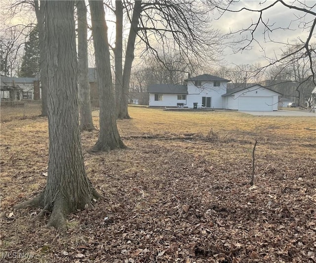 view of yard with an attached garage