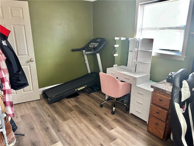 office space with wood finished floors