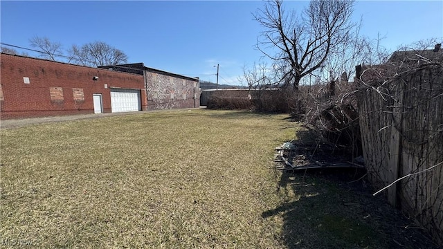 view of yard with an attached garage