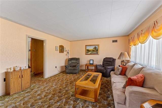 living room with visible vents, carpet flooring, and crown molding