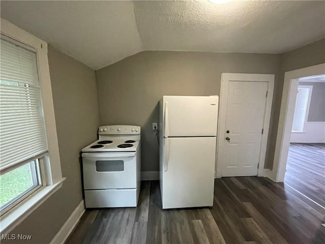 kitchen with white appliances, dark wood-style floors, lofted ceiling, and a textured ceiling