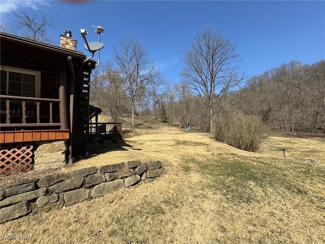 view of yard with a deck