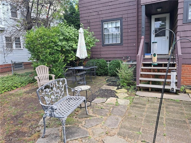 view of patio / terrace with fence