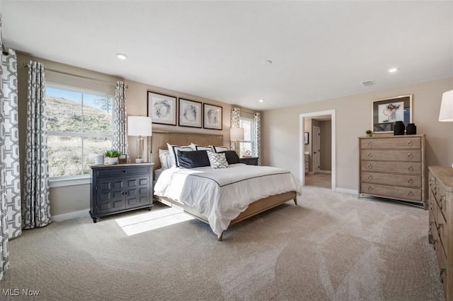 carpeted bedroom with visible vents, recessed lighting, and baseboards