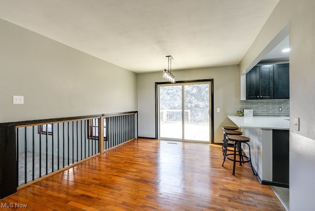 dining space featuring wood finished floors