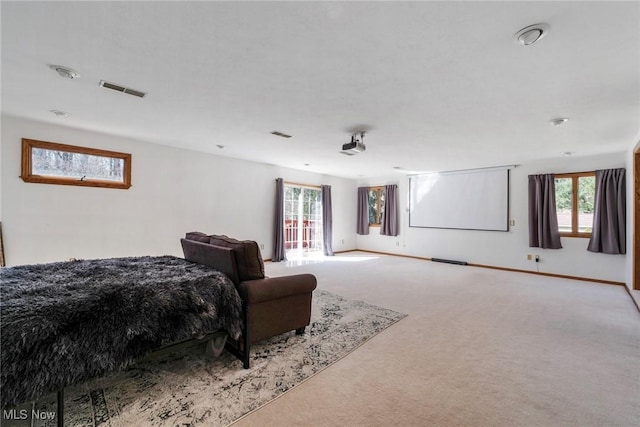 bedroom with visible vents, baseboards, and carpet