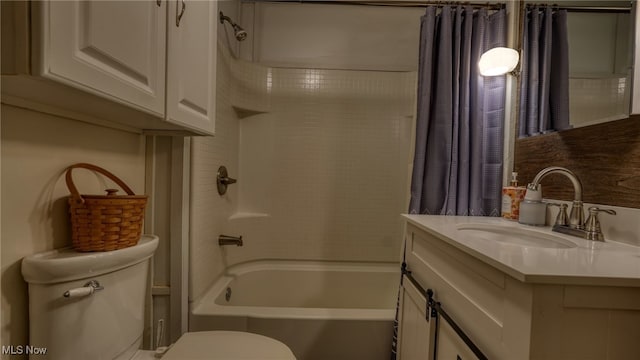 full bath featuring vanity, shower / tub combo, and toilet