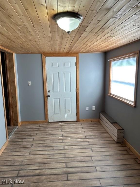 2046 Ohio Ave, East Liverpool, OH 43920 - unfurnished room featuring wood ceiling, baseboards, and wood finished floors