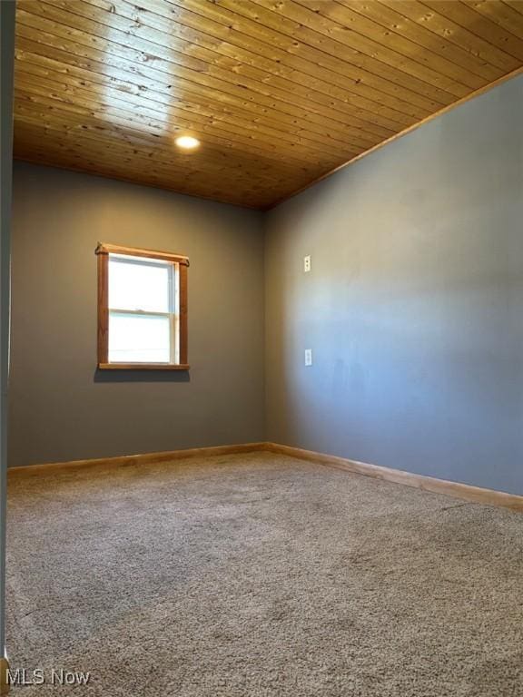 2046 Ohio Ave, East Liverpool, OH 43920 - spare room featuring wood ceiling, baseboards, and carpet floors