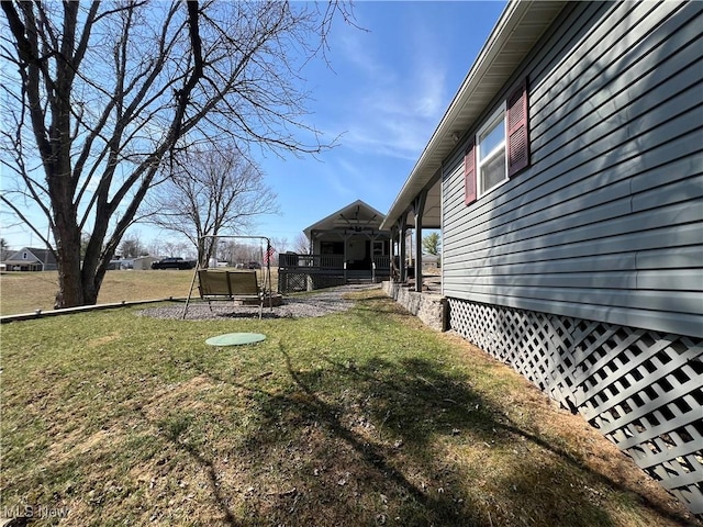 view of yard with a trampoline