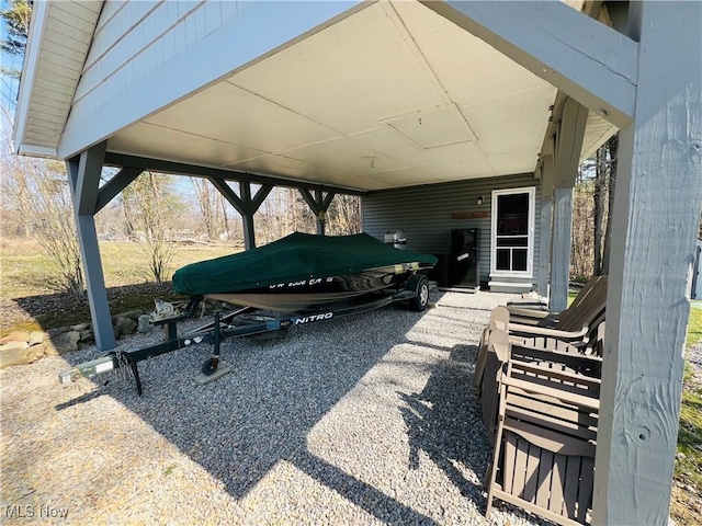 view of patio / terrace featuring an attached carport