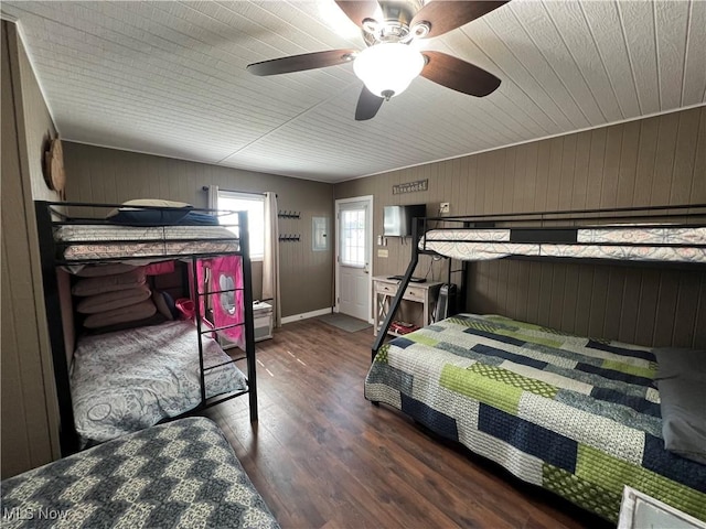 bedroom with dark wood finished floors and a ceiling fan