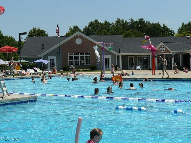 community pool with a patio