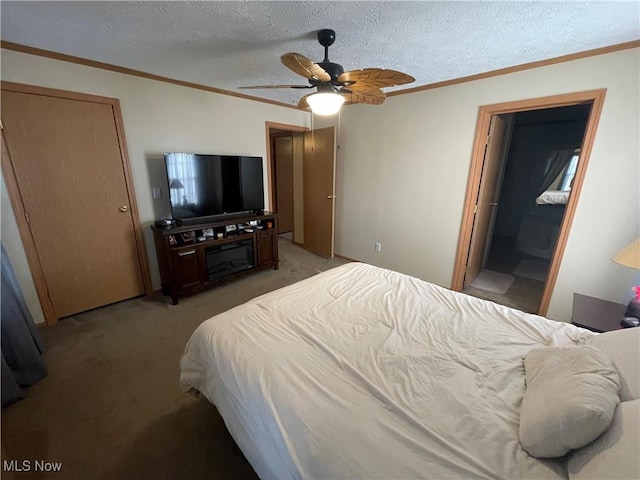 bedroom with light colored carpet, a textured ceiling, and ornamental molding